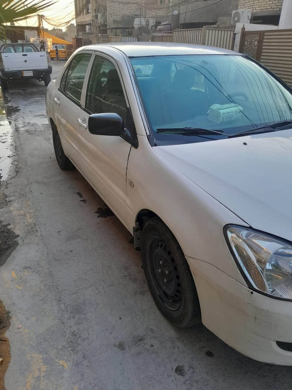 ‎لانسر ٢٠٠٦مصبوغه حزام***********‎ بغداد, العراق
