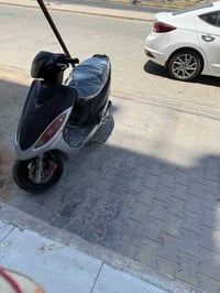 كيمكو • جي فور • محرك ما مفتوح