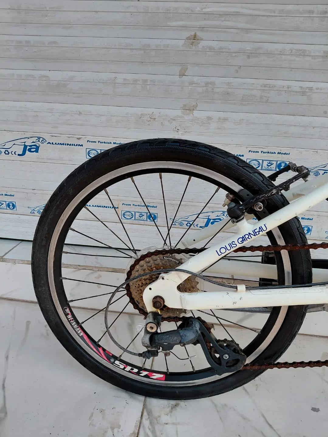 LOUIS GARNEAU FOLDING BIKE حجم 20 المنيوم بالكامل    ✈يوجد توصيل لجميع المحافضات ✈ كركوك مدخل سايدين حي الاسرى والمفقودين  معرض ابو شيفان ( *********** )
