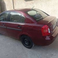 اكسنت ٢٠٠٩ • ماشيه ٩٦٠٠٠ • ضربة خلفيه