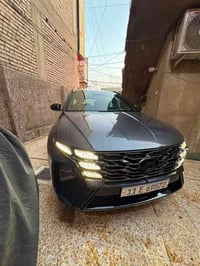 توسان ان لاين هايبرد  فول مواصفات ما عدا بنوراما مكينة 1600 تيربو  كشن...