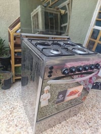 طباخ يونيفرسال استيل اربع عيون افران منفصله كله شغال تاخذون على الفحص ...