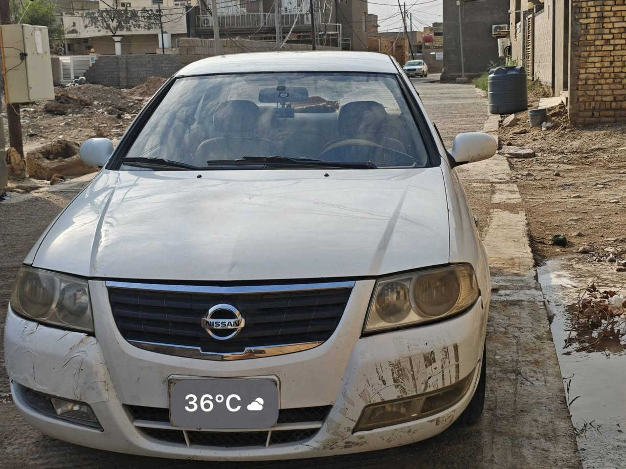 سلام عليكم
🚗 نيسان صني 2013 للبيع
​المحرك: 1800cc 
​المكان: واسط / الكوت
​الرقم: القادسية (كاملة الأوراق وجاهزة للتحويل)
​📌 أبرز المواصفات والحالة:
​تخم أطارات (تايرات) جديد
​بطارية جديدة
​المحرك والجير بحالة ممتازة جداً وما تحتاج أي مصاريف
​تبريد شغال و معروف قوته

​السعر المطلوب: 110 ورقة قابل للتفاوض البسيط للجادين.
​📞 للتواصل والاستفسار: *********** أو عبر مراسلة الخاص.

نص مكتوب في الصور:
- 36°C القادسية خصوصي
- 36°C