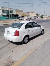 اكسنت • 2010 • بلاديه