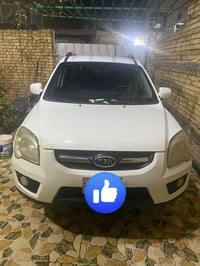 كيا سبورتج 2009 خليجي لون ابيض رقم بغداد بسمي تحويل مباشر تبريد شغال ك...