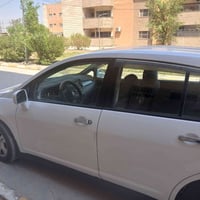 نيسان فيرزا ٢٠٠٨ بغداد بأسمي ماشيه ٩٥ الف محرك جديد جاهزةمن كلشي مابيه...