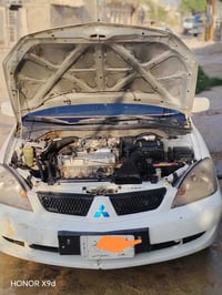 لانسر • ٢٠١١ • مكينه ٢٠٠٠