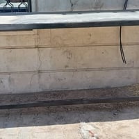 ميز حديد • طول ٢م • عرض ١م
