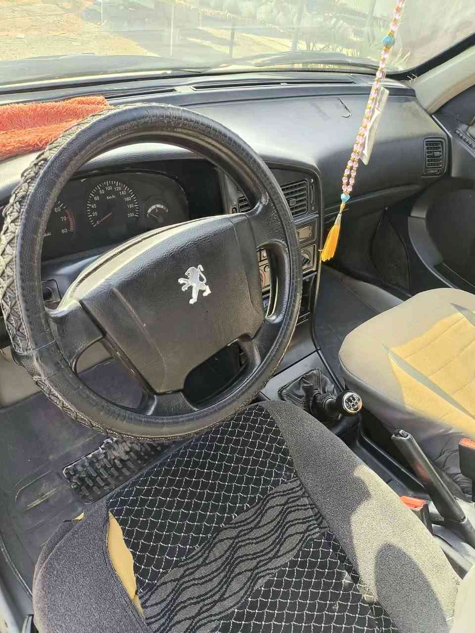 بيجو ٤٠٥ • ٢٠١٢ • انكليزي باسم المالك