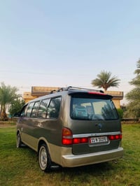 كيا بريجو • ٢٠٠٠ • رقم بغداد دولي