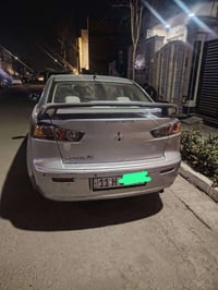 ميستبوشي لانسر قرش ٢٠١٦ بلادي كله بلادي بدون اي ضرر فقط بارد كم مكان و...