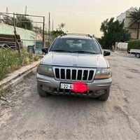 جيب شيروكي موديل 2000 فول موصفات  شاشة  كامرة  مري كهرباء  كشنات جالد ...