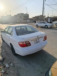 صني ٢٠٠١ • مكينة جديدة • الكوت شراي