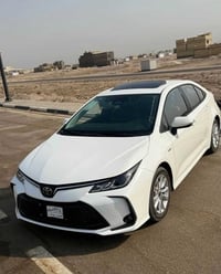 للبيع كورلا هايبرد2025 زيرو رقم بغداد باسمي السيارة مكان سيارة بغداد م...