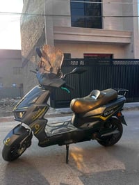 دراجه سكنس شحن  ‎ 7 بطاريات ‎38 امبير ملف 3000w قياس التاير 12/90/90 د...