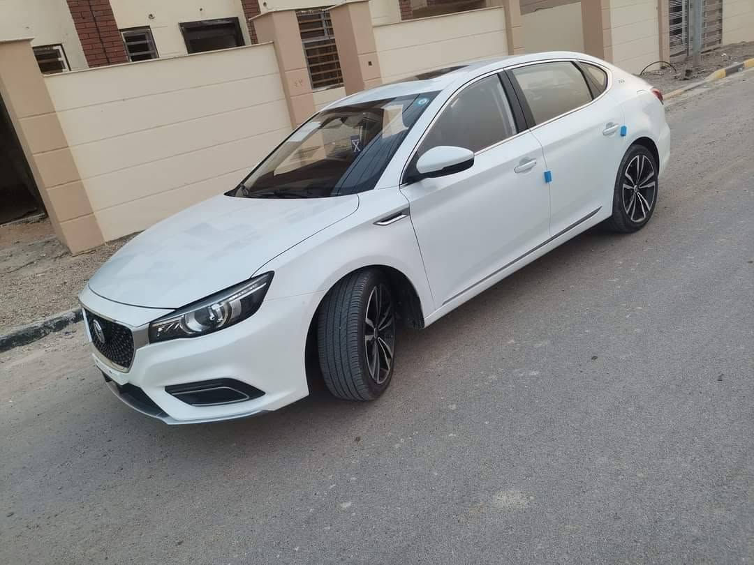 للبيع
موديل 2021
MG6
رقم بغداد مشروع وطني 
محرك 1.5 تيربو
بابين صبغ بدون دواخل طرف سكن
ناقل سرعة دبل كلتش7 سرعات
قوة المحرك 169 حصان
عزم الدوران 250 نيوتن / متر
مصابيح نهارية LED
مصابيح خلفية LED
مرايا كهربائية
اشارات في المرايا الكهربائية
مرايا قابلة للطي بشكل الكتروني
مقود جلد
مكابح توقف الكترونية EPB
مكابح انتظار الكترونية Auto Hold
نظام الثبات الالكتروني ESP
نظام توزيع قوة الكبح EPD
نظام مكابح المنعطفات CBC
نظام مراقبة ضغط الهواء في الاطارات
تكييف الكتروني ثنائي المنطقة
نوفذ كهربائية مع فتخ واغلاق اوتوماتيكي
مثبت سرعة 
ناقل سرعة في المقود ( بادل شيفتر )
بصمة
مسند يد خلفي مع حامل اكواب
مقود قابل للتعديل
شاشة 8 انش مع كاميرا
بلوتوث
مداخل USP مع شاحن
مداخل كهرباء 12 فولت
                                                           Android Auto                                                    
                                                        Apple Car Play                                                 
تحكم بالمقود
حساس خلفي
شاشة عدادات 3.5 انش
عادم مزدوج ( دبل اكزوزت )فتحة سقف
ويل كب 18 المنيوم
مقاعد جلد
مقعد سائق كهربائي ب6 حركات
6 وسائد هوائية
نوافذ كهربائية مع فتح واغلاق اوتوماتيكي لجميع النوافذ نظام الاضاءة التلقائية
اغلاق النوافذ تلقائيا عن قفل 
***********
سعر 105 ومجال قليل
