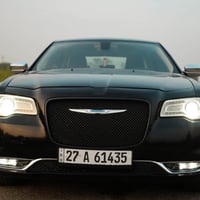 كرايسلر c300 2015 حادث امريكا جاملغ امامي  بيها مكانين بارد رقم ذي قار...