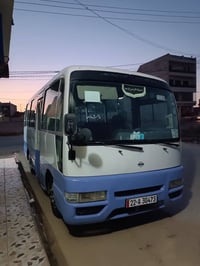 كوستر نيسان • ٢٠٠٢ • رقم اربيل