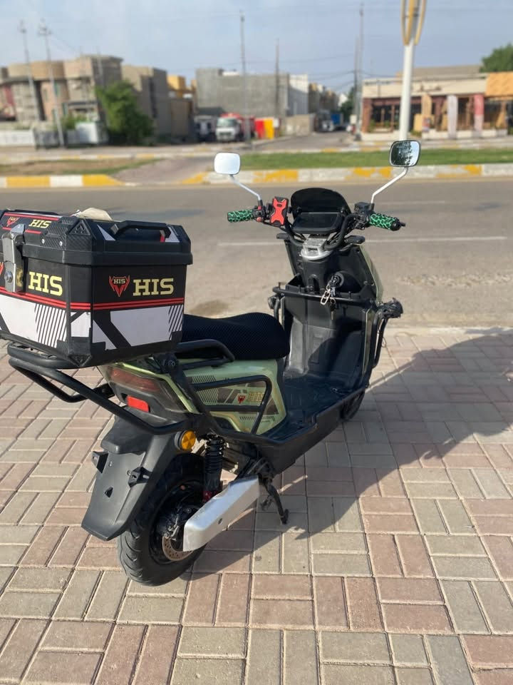 دراجة كهربا • بطاريات على فحص • بطارية منفوخة