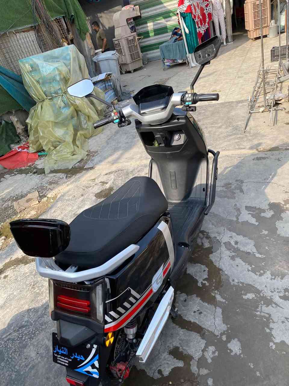 دراجة شحن • بطاريات مبدلة • شارع المطبك