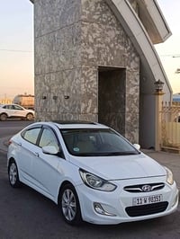 اكسنت ٢٠١٤ • ١٠٠٠٠٠ كم • رقم بغداد