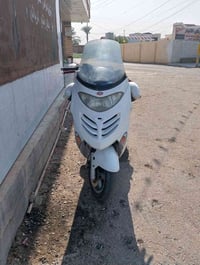 كيمكو • ١٢٥ • مكمرك