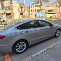 فورد فوجين هايبرد 2020 محرك 2000 ضررها قطعتين... بدون دواخل ماشية ٩٢ أ...