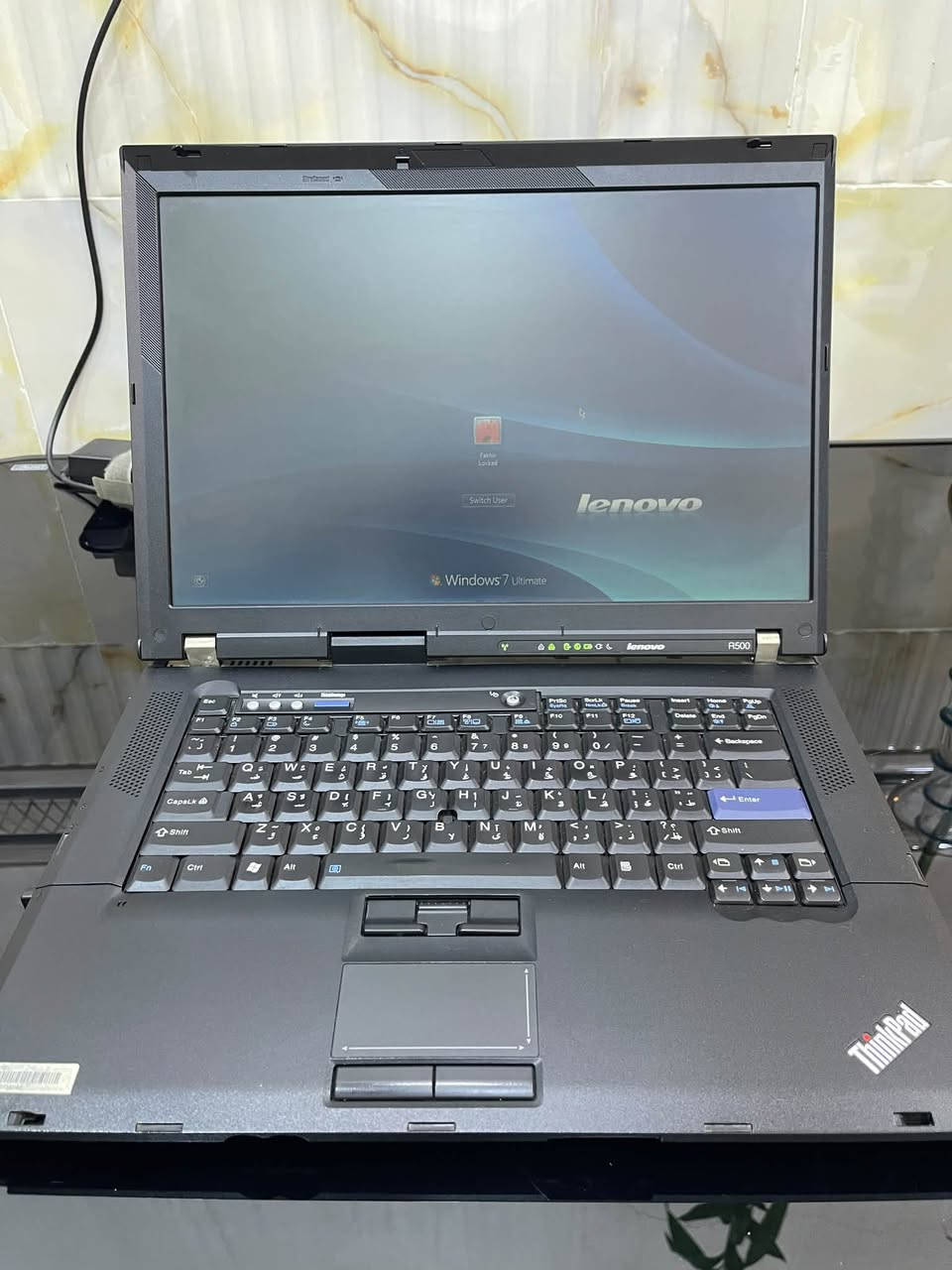 يلام عليكم لابتوب للبيع نوع ThinkPad R500 جهاز باله اصلي بي ضرر بسيط مثل ما موضح بصوره ينفع اصحاب الدراسة منصب عليه وندوز 7 بسعر 75.000 

توصيل متوفر.     ***********

نص مكتوب في الصور:
- Control Panel System and Security System
- Search Control Panel
- Home
- View basic information about your computer
- Windows edition
- Windows 7 Ultimate
- Copyright 2009 Microsoft Corporation. All rights reserved.
- System
- Manufacturer: Lenovo
- Model: Lenovo Win7 PC
- Rating: 2.7 Windows Experience Index
- Processor: Genuine Intel(R) CPU 575 @ 2.00GHz 2.00 GHz
- Installed memory (RAM): 2.00 GB
- System type: 32-bit Operating System
- Pen and Touch: No Pen or Touch Input is available for this Display
- Lenovo support
- Website: Online support
- Computer name, domain, and workgroup settings
- Computer name: Fakhir-PC
- Full computer name: Fakhir-PC
- Computer description:
- Workgroup: WORKGROUP
- Change settings
- Windows activation
- 21 days to activate, Activate Windows now
- Product ID: 00426-OEM-8992662-00537 Change product key
- EN
- 5:42 PM
- 9/24/2026