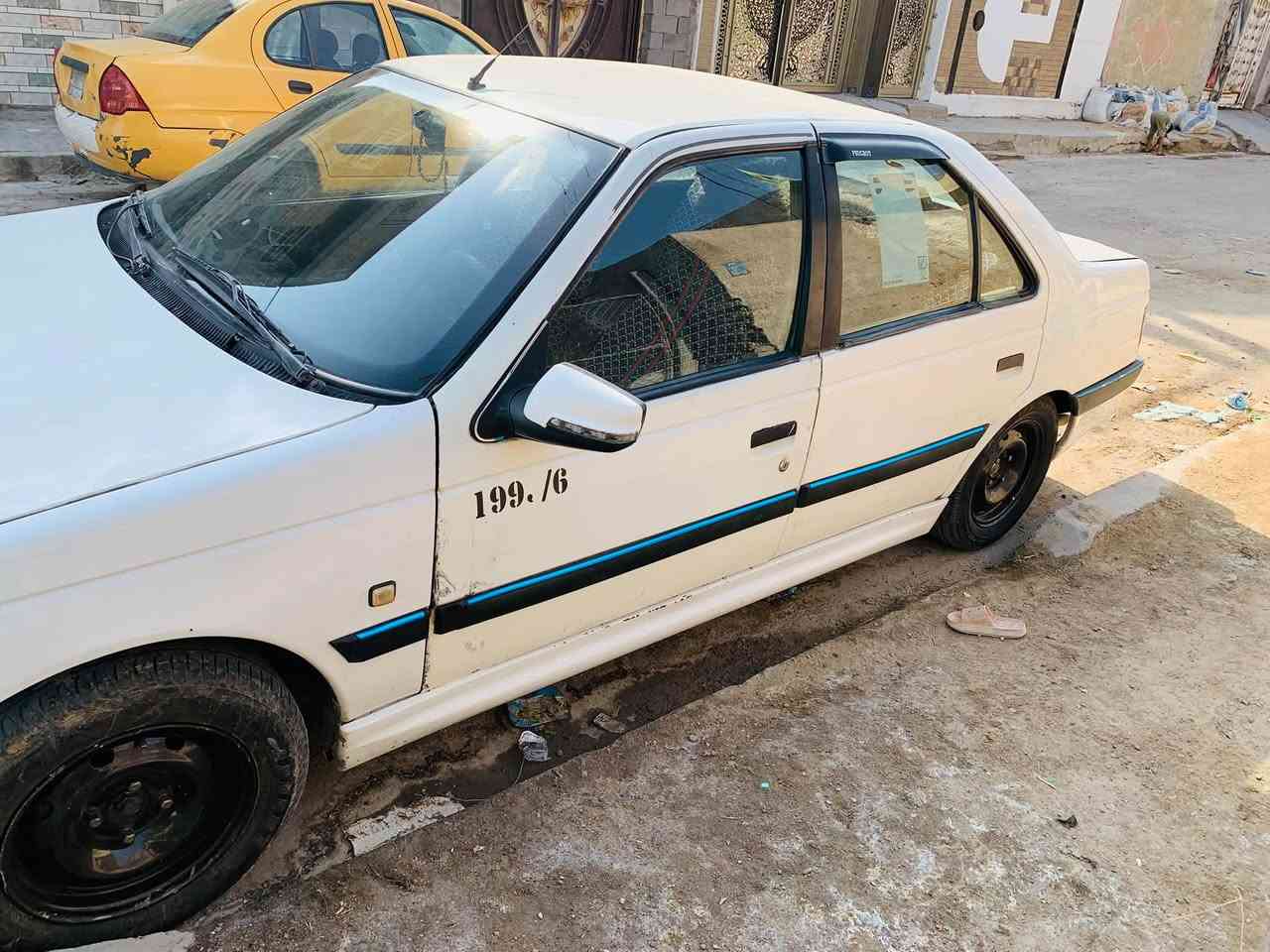 بيجو 405 نضيفه موديل ٢٠١٠ تبريد ثلج صدر نضافته 80 بلميه محرك بلادي تايرات جدد  البقيه موضح بلصور السعر ٣٣ متوفر فقط اتصال *********** المكان بغداد

نص مكتوب في الصور:
- 1