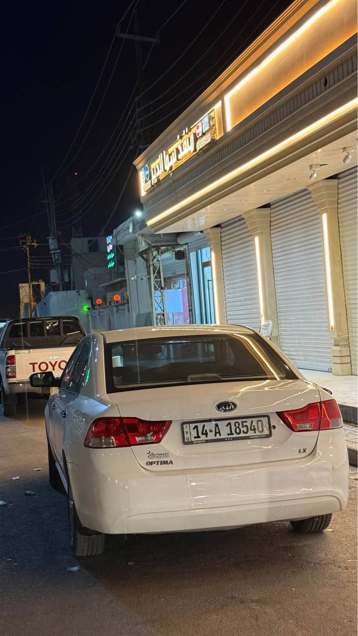 كيا اوبتما ١٠خليجي كفاله ما عدا طخه قليله بلباب خلفي عكس سايق سياره ع أيد وحده من ٢٠١٠ كير مكينه بلاد جاهز من كلشي سعر ١٢٥ وبيع مجال قليل  مكان البصره ر ه *********** البصرة, العراق
