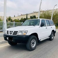 نيسان باترول موديل / 2002 تحويل أصل (شغالة)  الصبغ / بدون صبغ، بس بيها...