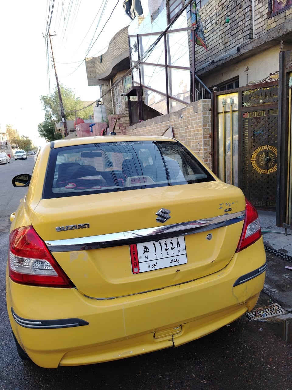 سازوكي سويفت صفره بغداد  ٢٠١٤ محرك ١٤٠٠ محرك جديد حاوية بيها ضربة بدعامية ومبدلة السعر ٦٠ رقم *********** مكاني بغداد
