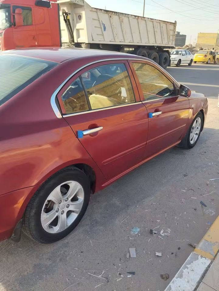 سلام عليكم كيا اوبتيما خليجي 2009بدل بيه باب السايق 
وبنيدوحملغ معمر بدون دواخل رقم ذي قار 
الناصريه مكاني 78وبيه مجال ***********
