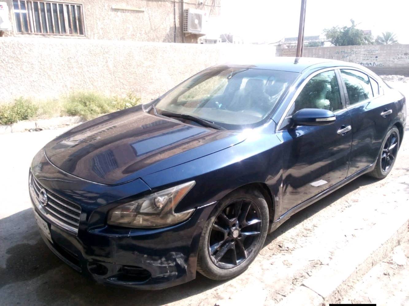 نيسان مكزما2010 بغداد بسمي محرك وكير جديد حاويه تبريد ثلج فول مواصفات للبيع او مراوس حسب القناعه***********