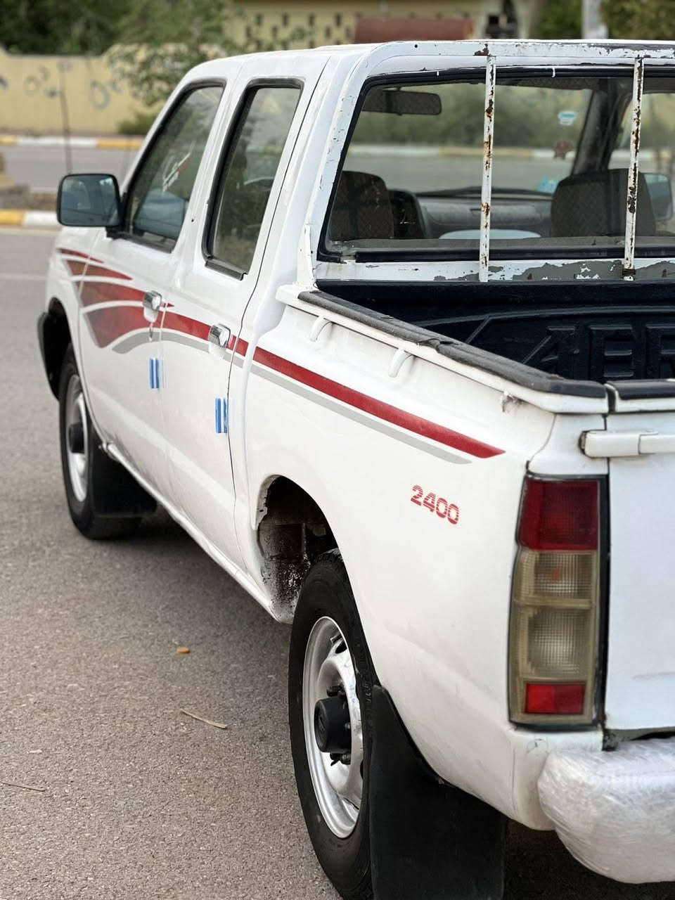 نيسان بيكاب • ٢٠٠٢ • قفل مركزي