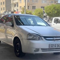 اوپترا ٢٠١٠ • ابيض • رقم اربيل