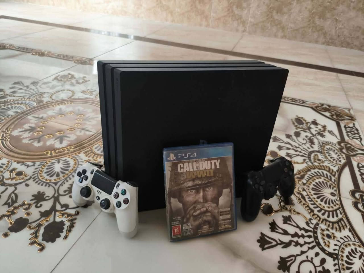 جهاز PS4 Proمستعمل يحتاج الى تبديل المعجون واليدات عطلانات ويا قرص شغال call of duty الحرب العالميه الثانيه السعر 300 وبي مجال العنوان الديوانية التقيه 
للاستفسار واتساب ***********
