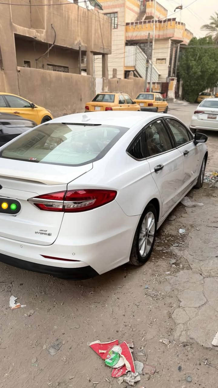 فورد فيوجن موديل ٢٠١٩ هايبرد محرك ٢٠٠٠ تنفس طبيعي رقم انكليزي كلين بدون ايرباك ودواخل الطخه  راجعه بادر قفط تكحيلSE السعر ١٣٠$ ***********

