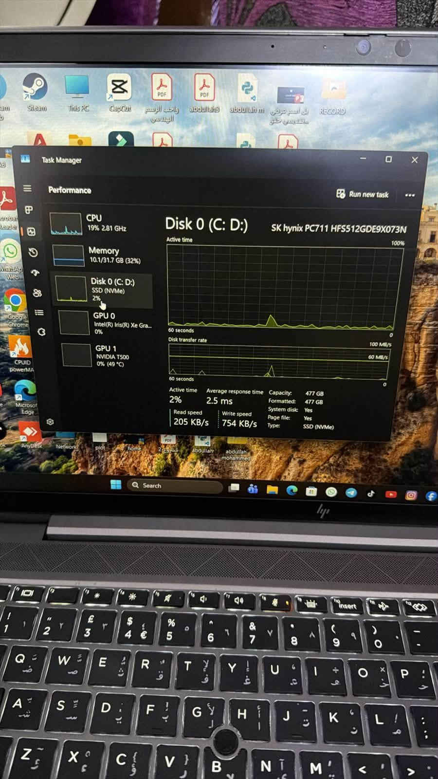 السلام عليكم لابتوب HB ZBOOK حجم الشاشه 15.6 

• المعالج: Intel Core i7-1165G7
• عدد الأنوية والمشارات: 4Cores / 8Threads - 12MB Cache
• الرام: 32GB DDR4
• التخزين: 512GB NVMe SSD (SK hynix)
• كرت الشاشة المنفصل: NVIDIA T500 (4GB)
• كرت الشاشة المدمج: Intel Iris Xe Graphics
السعر 850 الف مكاني بغداد الغدير 
تواصل ***********

نص مكتوب في الصور:
- Task Manager
- Performance
- CPU
- 9% 1.63 GHz
- Memory
- 10.1/31.7 GB (32%)
- Disk 0 (C: D:)
- SSD (NVMe)
- 3%
- GPU 0
- Intel(R) Iris(R) Xe Gra...
- 0%
- GPU 1
- NVIDIA T500
- 0% (49 °C)
- 32.0 GB DDR4
- 31.7 GB
- Memory usage
- 60 seconds
- Memory composition
- In use (Compressed)
- 10.1 GB (20.9 MB)
- Available
- 21.5 GB
- Speed:
- 2667 MT/s
- Slots used:
- 2 of 2
- Form factor:
- SODIMM
- Committed
- 9.1/33.7 GB
- Cached
- 4.5 GB
- Hardware reserved:
- 320 MB
- Paged pool
- 448 MB
- Non-paged pool
- 783 MB
- Run new task
- Search
- Task Manager Performance Run new task CPU 6% 2.11 GHz Memory 10.1/31.7 GB (32%) Disk 0 (C: D:) SSD (NVMe) 4% GPU 0 Intel(R) Iris(R) Xe Gra... 0% GPU 1 NVIDIA T500 0% (49 °C) CPU 11th Gen Intel(R) Core(TM) i7-1165G7 @ 2.80GHz % Utilization 100% 60 seconds 0 Utilization 6% Speed 2.11 GHz Base speed: 2.80 GHz Sockets: 1 Cores: 4 Processes Threads Handles Logical processors: 8 275 4790 123874 Virtualization: Enabled Up time L1 cache: 320 KB 11:01:55:19 L2 cache: 5.0 MB L3 cache: 12.0 MB Search Steam This PC CapCut PDF PDF m abdullah abdullah m في السعر عرضى ... واجب الرسم الهندسي مصطفى يحيى حقوق A Anydesk Network plot home 2 مشروع abdullah abdullah mohammed
- Steam This PC CapCut واجب الرسم الهندسي abdullah abdullah m من ااسمر عرضي تسجيل شاشق RECORD Task Manager Performance Run new task CPU 19% 2.81 GHz Memory 10.1/31.7 GB (32%) Disk 0 (C: D:) SSD (NVMe) 2% GPU 0 Intel(R) Iris(R) Xe Gra... 0% GPU 1 NVIDIA T500 0% (49 °C) Disk 0 (C: D:) SK hynix PC711 HFS512GDE9X073N Active time 100% 60 seconds Disk transfer rate 100 MB/s 60 MB/s 60 seconds Active time 2% Average response time 2.5 ms Read speed 205 KB/s Write speed 754 KB/s Capacity: 477 GB Formatted: 477 GB System disk: Yes Page file: Yes Type: SSD (NVMe) WhatsApp Web Google Chrome CPUID powerMA Microsoft Edge AnyDesk network plot home pdf abdullah abdullah mohammed Q Search
- 15% 1.84 GHz
- 10.4/31.7 GB (33%)
- 5%
- 0% (47 °C)
- GPU
- Intel(R) Iris(R) Xe Graphics
- 3D
- Copy
- Video Decode
- Video Processing
- Shared GPU memory
- 15.8 GB
- Utilization
- GPU Memory
- 0.6/15.8 GB
- Driver version:
- Driver date:
- DirectX version:
- Physical location:
- 32.0.101.7084
- 1/15/2026
- 12 (FL 12.1)
- PCI bus 0, devic...