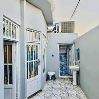 بيتين متجاورين • ١٠٠م • النجف الاشرف