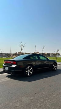 تشارجر V6 • ٢٠١٤ • جلد احمر
