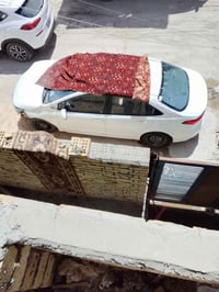 كورولا2025 بيها حادث خشم البكم فقط ماشيه 32 للبيع07783346174