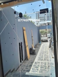 الامنيوم • زجاج سيكوريت • ابواب اوتوماتيك