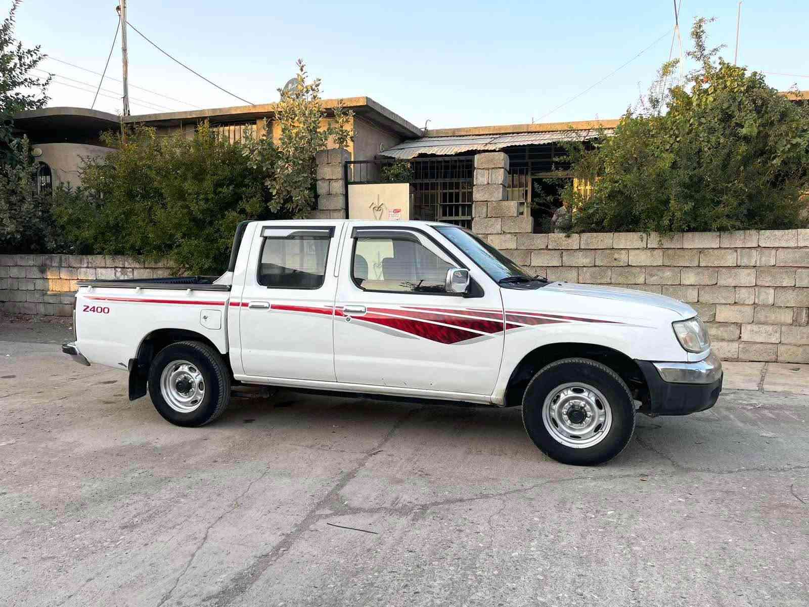 نيسان محسن • قفل مركزي • ٢٠٣٠