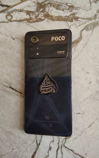 بوكو اكس فور برو فايف جي  جهاز مكسوره شاشته فقط  مع كامل ملحقاته كرتون...