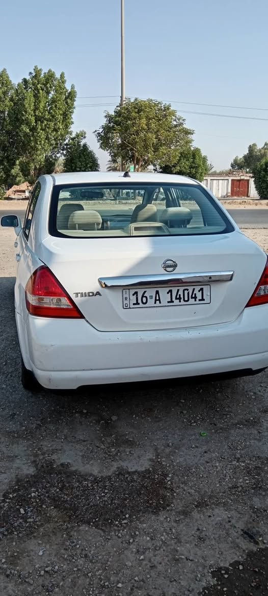 نيسان تيدا ٢٠٠٩ رقم قادسيه بيه صفحه صبغ أثر ضربه ستوتا من جوه الايده مال باب صدرها نص عمر تبريد مكينه كير مكفوله بيع او مرواس *********** ديوانية, القادسية
