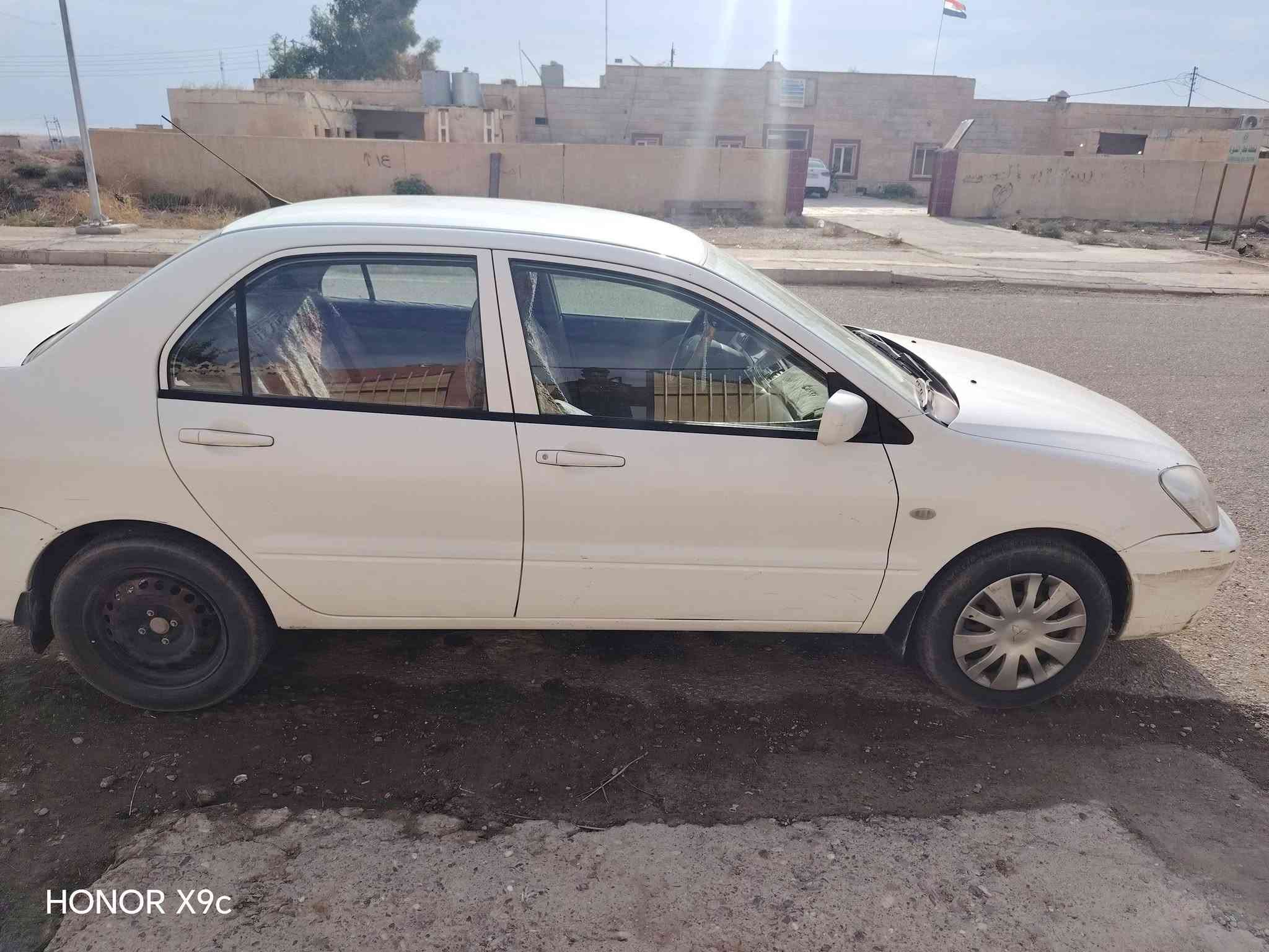 لانسر بوم • ٢٠١١ • مكيف