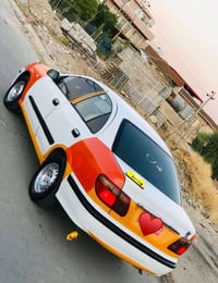 تاكسي • ابيض • ٢٠٠١