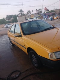 بيجو روئ موديل 2009 رقم بغداد مشروع وطني  لتوضيح سياره مكينه مكفوله بس...