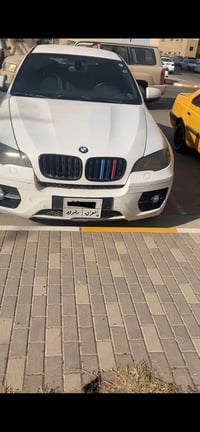 BMW X6 2010 اصل كاز ومحورة مكينة وكير لكزز  كيرها منتهي والمكينة بيها ...